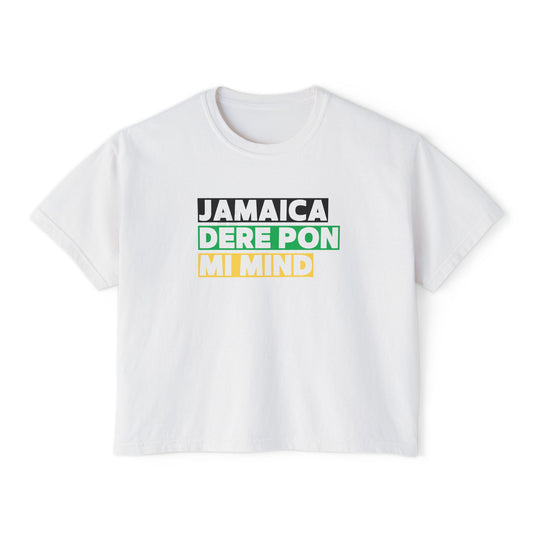White Cropped Graphic T-shirt with 'Jamaica Dere Pon Mi Mind' printed in bold text with a Black, Green and Gold Background.